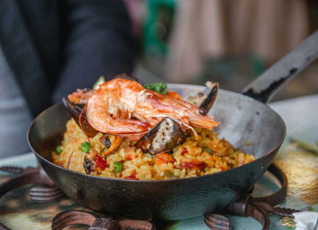 Traditional Spanish Dish with Seafood Served in the Pan