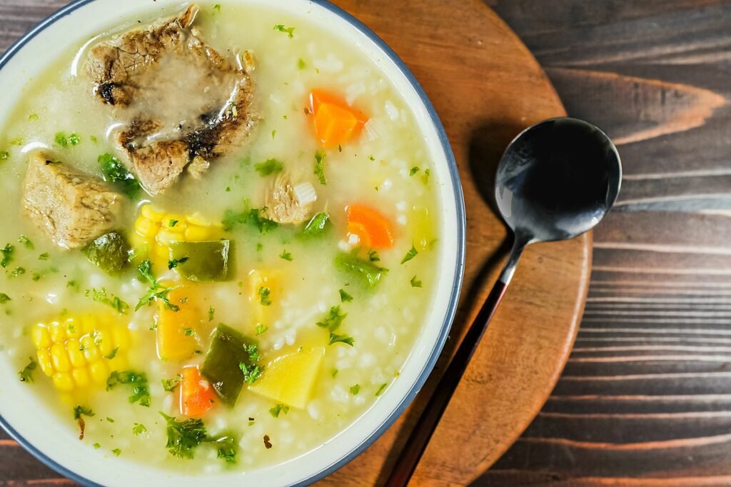 a bowl of soup with a spoon